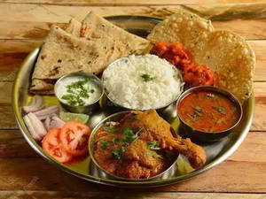 Bangali Murgir Jhol Thali (rice+dal+ Chicken Kosa-2pc+chatni +papad)