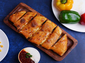 Achari Paneer Tikka Stuffed Garlic Bread