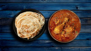 2 Porota + Half Chicken Masala [250ML]