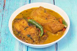 Macher Jhol Cooked With Vegetable