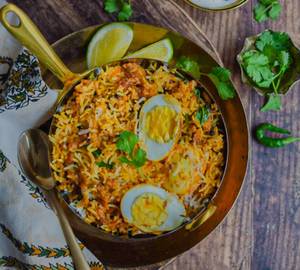 Egg Biryani With Raita And Salan