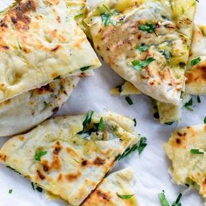 Paneer Stuffed Naan 1 Pc