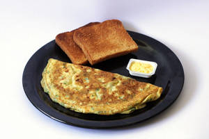 Loaded Herbed Cheesy Omelette With Toast & Butter