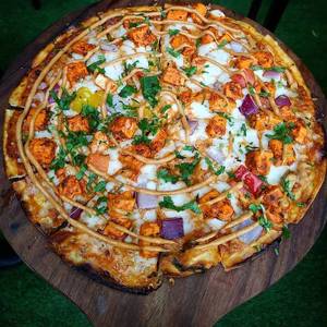 Paneer Tikka Pizza ( Spicy Cheese St.Crust)