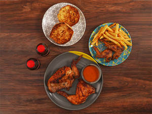 1/2 chicken +2 wings +PERi-Chips+Garlic bread +PERi-PERi Dip+2 Coke