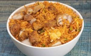 Triple Chicken Schezwan Fried Rice