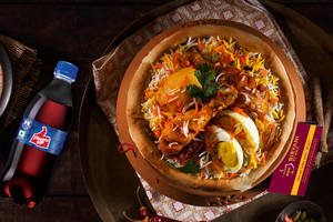 Toofani Kolkata Chicken Biryani + Thums up