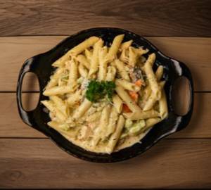 Veg Penne Pasta In White Of Sauce                     