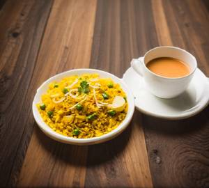 Poha with tea and 2 aloo paratha