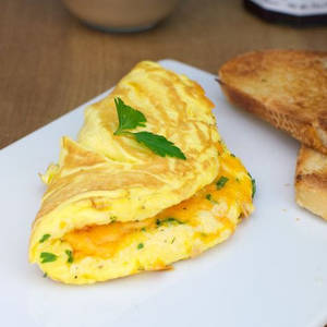 Cheese Omlette With Toast And Butter