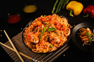 Schezwan Mushroom Fried Noodles