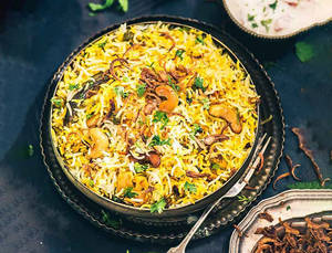 Veg Biryani (served With Raita)