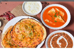 Kadhai Panner +dal Makani+2 Butter Nan+ Raita