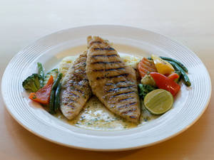 Grilled Fish In Garlic Butter Sauce