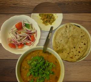 Dal Tadka and 4 Tawa Roti with Rice and Dry veg