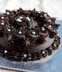 Dark chocolate garnishing cake