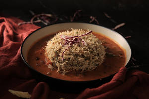 Herbed Rice With Red Exotic Gravy
