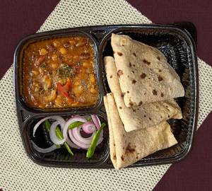 4 Tawa roti with Tadka dal and salad.