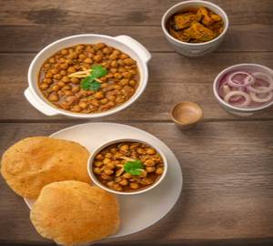 Masala Chhole +  Jeera Rice  + Pickle + 6 puri + Boondi raita + salad combo