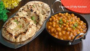 Chole + 2 Butter. Roti