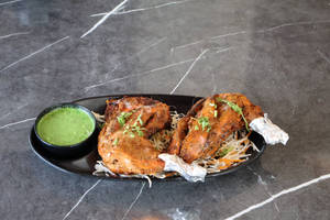 Tandoori Chicken (half) ( serve 4 pies )