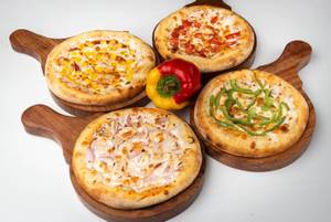Free [ 7up 250ml ] + 4 Veg Double Topping Pizza