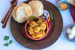 Luchi [4 pieces] + aloo dum [4 piece] + misti + salad