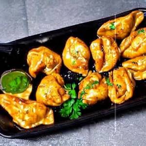Chicken Momo In Chilli Garlic Sauce