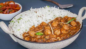Chole And Chawal With Onion And Salad