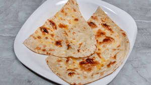 Butter Naan ( 1 Pc )