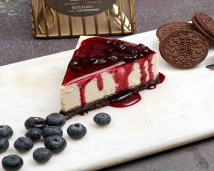 Blueberry Compote + Exquisite New York Cheesecake Slice