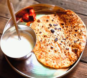 Paneer paratha with pickle and curd                