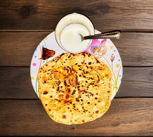 Aloo paratha with pickle and curd