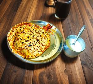 Aloo pyaz paratha with pickle and curd         