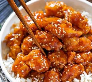 sweet and sour chicken with butter garlic rice