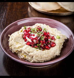 BABA GHANOUJ (Served with our house-made puffed pita)