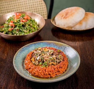 MOUHAMARA (Served with our house-made puffed pita)