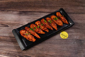 Chicken Momo In Chili Garlic Sauce (8pcs)