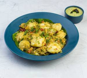 Tossed ghee mango's ginger button idli (seasonal)