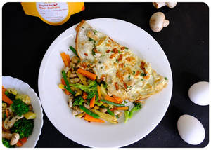 Toasted Mushroom And Cheese Omelette With Sauteed Vegetables