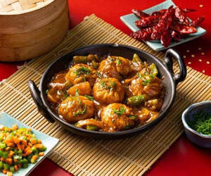 Chilli Momos (8 Pcs)