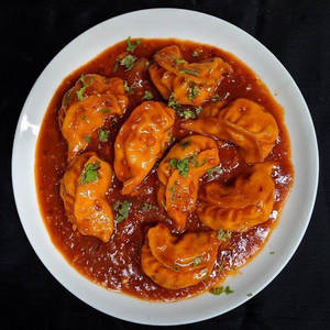 Paneer Momos In Roganjosh Gravy