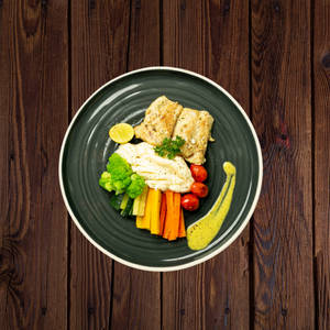 Mustard Marinated Grilled Fish Served With Tossed Vegetables