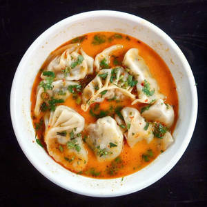 Veg Momos In Makhani Gravy