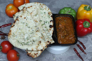 Chicken Handi With Garlic Naan