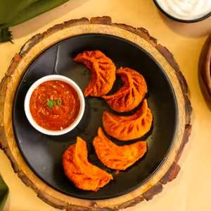Chicken momos [fried 5 pcs]