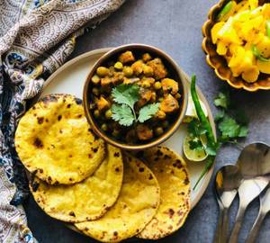 Besan ki roti with aloo matar greavy