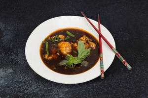 Fish Tossed In Basil Sauce And Olive Oil