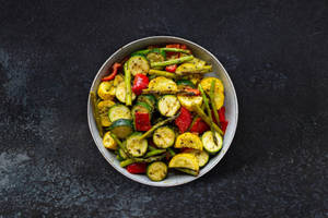 Mixed Veggies Tossed In Basil Sauce And Olive Oil