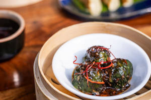 Chicken In Crushed Pepper Sauce Wrapped In Bokchoy